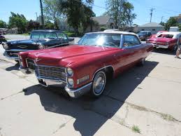 Image result for Claret Maroon 1966 Cadillac