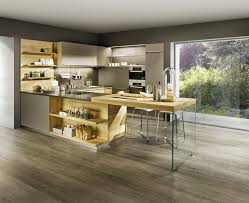 Despite Its Solid Material Thickness The Transparent Glass Support Piece Gives The Extend Modern Kitchen Design Top Kitchen Trends Kitchen Inspiration Modern