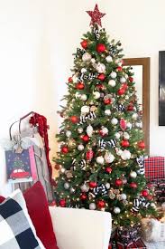 You can't go wrong with checkered adornments. Our First Christmas Home Tour At Orchard House Abby Lawson