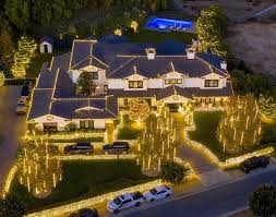 The keeping up with the kardashians star often shares photos of her hidden hills home on instagram. Kylie Jenner And Kim Kardashian Splash 100k To Light Up Mega Mansions For Christmas Mirror Online