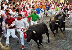 Participants run next to miura fighting bulls on the last bullrun of the san fermin festival in pamplona, northern spain, on july 12, 2019. 40 Running Of The Bulls Ideas Running Of The Bulls Pamplona Running