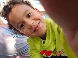 My boy Jack he likes to flap and spin He twirls around he runs around I  love to watch him stim My boy Jack likes to eat lots of crunchy foods and