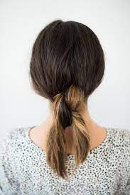 Double Knotted Low Ponytail Hair Tutorial The Effortless Chic Casual Hair Updos Hair Styles Haircut Styles For Women