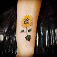 The meaning is represented in the life of a lotus flower as it grows through the mud, yet maintains pure as it blooms on the water's surface. 155 Sunflower Tattoos That Will Make You Glow Wild Tattoo Art
