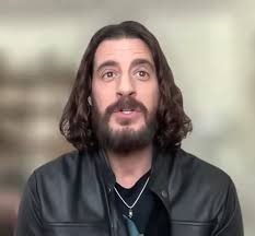 Gwen Stefani is facing backlash after praising an interview between Tucker  Carlson and "The Chosen" actor Jonathan Roumie.