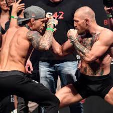 Replacement opponent rafael dos anjos also weighed in at 156lb and will step in should either mcgregor or poirier be forced to pull out before the first. Ufc 257 Video Dustin Poirier Vs Conor Mcgregor 2 Weigh In Staredown Mma Fighting