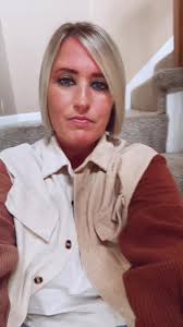 Katelyn Cleaning The Graves