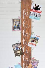 Floral wire or yarn or ribbon; 20 Diy Christmas Card Holder Ideas How To Display Christmas Cards