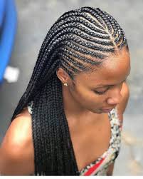 The style consists of four large braids that alternate with small zigzag lines. Nara Hair Braiding On Instagram Tribal Braids Africanside In 2020 Lemonade Braids Hairstyles African Hair Braiding Styles Braided Hairstyles