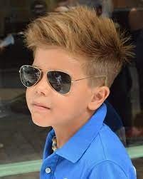 Long top layers are swept to one side and tucked behind the ear, creating a rock 'n roll vibe. 90 Cool Haircuts For Kids For 2021
