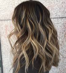 It has become a famous hairstyle for women who desire to bring life to their tresses without all the hassle of the modern blend of highlights and balayage of ash brown on black hair with beach waves on the client. 35 Sexy Black Hair With Highlights You Need To Try In 2020