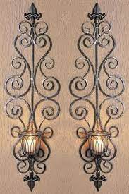 Explore candelabras and sconces for new ideas replacing electric light bulbs. Loading Iron Wall Candle Holders Wrought Iron Wall Decor Metal Candle Holders