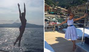 Kylie Minogue Displays Her Best Asset In Tiny Bikini As She Jumps Off Yacht In Italy Celebrity News Showbiz Tv Express Co Uk
