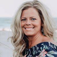 Under the Magnolias by T.I. Lowe