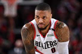 Recently drafted guard damian lillard of the trail blazers has a huge script tattoo on his left arm that stretches from the top of his shoulder down to his elbow that you probably noticed. Damian Lillard S 18 Tattoos Their Meanings Body Art Guru