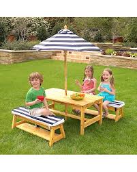 Cushions are made with sunbrella® fabric that is resistant to stains, mildew, chlorine and fading Kidkraft Outdoor Table And Bench Set With Cushions Umbrella Wood Unisex Bambini