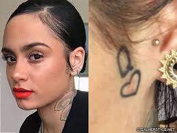 The feather tattoo is one of the most sought after tattoo design given its cultural symbolism and the feather tattoo comes in different styles and designs and has quite a rich background with meaning image shared by wild spirit. Kehlani S 11 Tattoos Meanings Steal Her Style Queen Of Hearts Tattoo Kehlani Tattoo Black Heart Tattoos