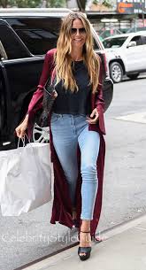 Heidi klum tries to make a model laugh by tickling her sidesheidi hlum prova a far ridere una modella facendole il solletico. Heidi Klum Fashion Outfits Celebrity Style Guide