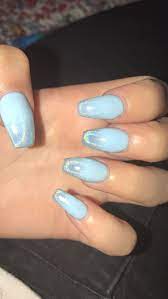 This matte prussian blue with the golden endings in each nail is one of the best designs! Baby Blue With Silver Chrome Blue Acrylic Nails Blue In 2021 Blue Acrylic Nails Blue Nails Holographic Nails