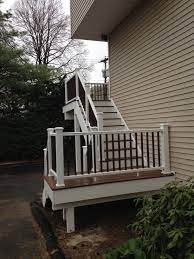 Stairs Landing Railings Second Story Deck Replaced For Corner Condo Unit Exterior Stairs Deck Stair Railing Porch Design