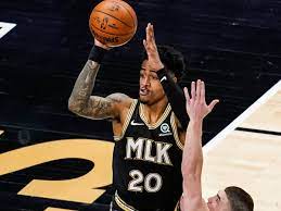 John collins is an accomplished australian singer songwriter and comedian. Hawks John Collins Opens Up About Nearly Getting Traded Sports Illustrated