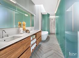 Don't wait, and start building your beautiful frameless glass shower now. Contemporary White Bathroom With Frosted Glass Wall Luxe Interiors Design