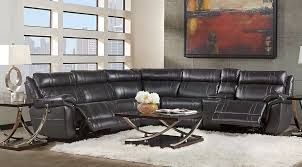 The leather sofa tends to overwhelm the space, being the first thing you look at in the room. Black Gray Ivory Living Room Furniture Decorating Ideas