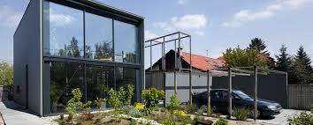 Old wrought iron is used throughout the home. Low Budget Projekte Architekt Moosmann