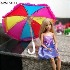 Participe aux activités de barbie! Parasol Pour Barbie Uni Ou A Motifs