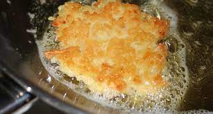 In a medium bowl, beat 2 large eggs with a fork until blended. Latke Wikipedia
