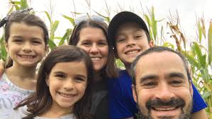 Young girl supported by Lyme Disease advocate, her mom