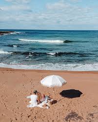 white beach umbrella beach umbrella beach aesthetic australia beach