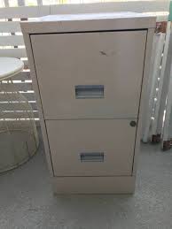 Moving ladders and buckets can be helpful with friend. How To Paint Metal Cabinets Easily Colorful Designer