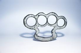With small liberty spikes protruding from the frame of the knuckles, it really is a show stopper. Brass Knuckles Tattoo Design History And Symbolism