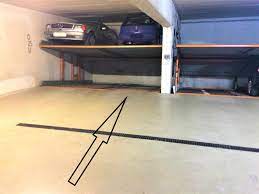 One side is 2 stories with 2 bedroom, 2 bath an attached carport. Stellplatz In Tiefgarage Forstenrieder Allee Duplex Garage