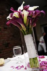 Tall grass and cymbidium orchid blooms add the finishing touches. Cheap Calla Lily Centerpiece Ideas Great For Wedding Table Decorations