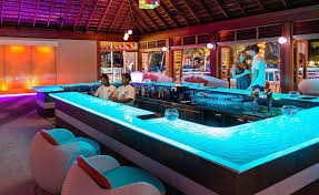 Luxury modern villa standing on top of mountain at sea shore. Glass Bar Top By Thinkglass At Meeru Island Resort Spa Thinkglass