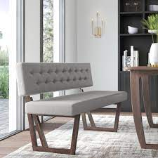 The dining table has four straight legs and a rectangular tabletop. Wayfair Dining Benches With Backs You Ll Love In 2021