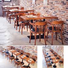 The seat is upholstered in black vinyl. Wooden Restaurant Chairs Commercial Dining Chairs