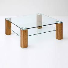 The top is made of tempered glass to give the product a light appearance and enhance the underlying simple and ingenious structure, making the details of the joints and the. 36 Wood And Glass Coffee Tables Ideas Coffee Table Coffee Table Design Glass Coffee Table