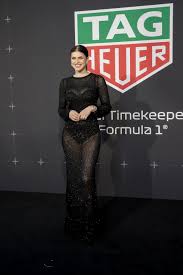 Alexandra Daddario Goes Sheer in Shimmering Black Maxidress for the Formula  1 Australian Grand Prix With Tag Heuer Party in Melbourne