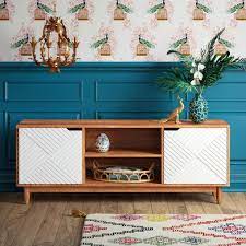 A credenza desk, typically referred to as a credenza, is a piece of furniture that provides extra desk or storage space. What Is A Credenza Credenza Vs Sideboard Vs Buffet How To Choose Hgtv