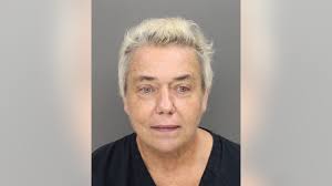 Officers charge woman with arson in connection to Kennesaw house fire