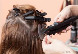 The natural hair is sectioned and the weave is attached to the hair, near the scalp, with glue. What Is A Human Hair Weave With Pictures