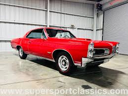 Image result for Ruby Red 1966 AC Cars