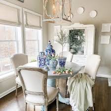 The base and top give this table a sleek, warm aesthetic, allowing it to fit seamlessly into any dining room setting. Expert Advice How To Design A Perfectly Scaled Dining Room Kathy Kuo Blog Kathy Kuo Home
