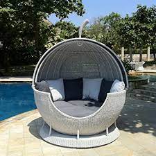 For this post, i have put together a collection of the best 6 rattan day beds currently available. Rattan Daybed Garden Daybed With Moveable Canopy In Soft Stone Amazon Co Uk Home Kitchen