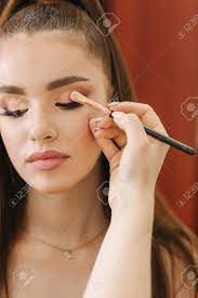 Six years ago, a florida college freshman named michelle phan opened up a macbook pro, on loan from her school, and uploaded to youtube a video of herself putting on makeup. Model Have A Makeup By Makeup Artist In Beauty Salon First Person Stock Photo Picture And Royalty Free Image Image 125033921