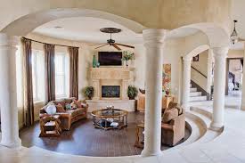 The room of the great vase in the western wing features the 2.57 m (8.4 ft) high kolyvan vase, weighing 19 t (42,000 lb), made of jasper in 1843 and installed before the walls were erected. Spanish Style Home Sunken Great Room Mediterranean Family Room Austin By Rustico Tile And Stone Houzz