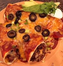 Beef enchiladas with an extra tasty, saucy filling, smothered with a homemade enchilada sauce. Easy Ground Beef Enchiladas Norine S Nest